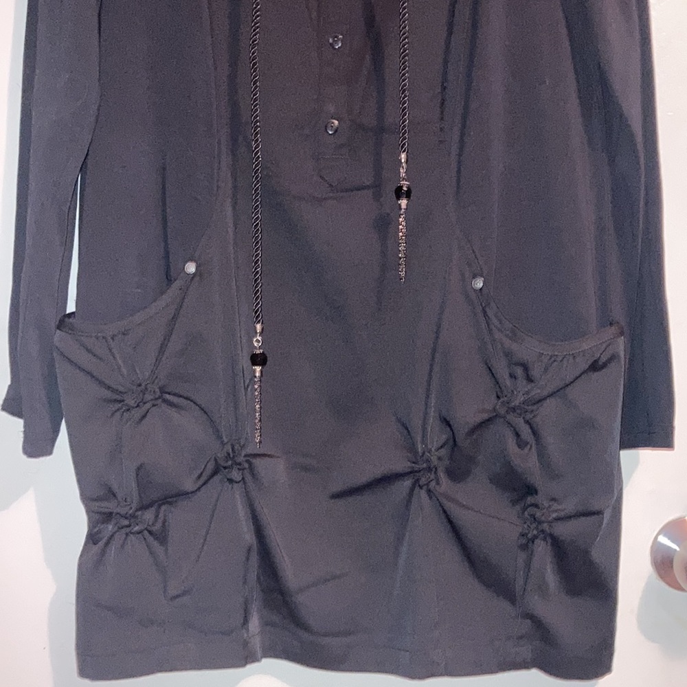 Like new Tribal long shirt, size L. Beautiful detail on pockets!